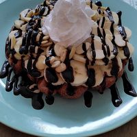 Vegan waffle with Chocolate, banana, almonds and wipped cream at Heart-Garden Waffles & Coffee in Amsterdam