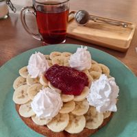 Vegan waffle with vegan whipped cream amd strawberry jam at Heart-Garden Waffles & Coffee in Amsterdam