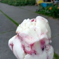 Two scoops (partially eaten) of cheesecake ice cream at IceLab NiceCream Creations in Antwerpen