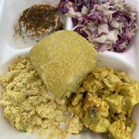 Pit stop sampler with crab cake, slaw, curried tofu, egg salad and a challah bun.   at Root 66 Cafe in Santa Fe