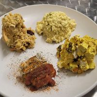Pit stop sampler with chickpea salad, egg salad, curried tofu, and crab cake at Root 66 Cafe in Santa Fe
