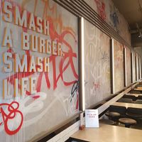 Seating area at Huxtaburger in Redfern