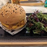 Mushroom burger with "cheddar" sauce and caramelized onions. Yum! at BEIJU HEALTHY FUN FOOD in Cascais