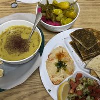 Lentil soup, hummus, pickled vegetables, Lebanese salad, za’atar bread  at Mazzah in Boise