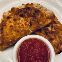 Macaroni & Soy Meatball empanadas at The Happy Pig Vegan Comfort Food in Bellmore