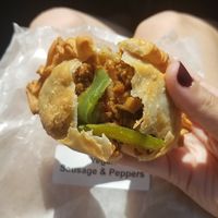 Sausage and peppers empanada at The Happy Pig Vegan Comfort Food in Bellmore