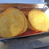 Potato cakes & vegan spring rolls underneath at Hunky Dory in Highett
