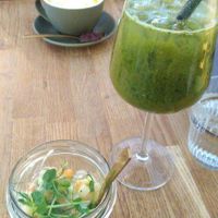 Estonian potato salad, Orange matcha (in wine glass) and Turmeric latte (in the back) at Kringel in Tallinn
