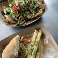 Loaded nachos & half of a Philly with queso fries at Soul Miner's Garden - Food Truck in Charlotte