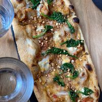 Artichoke spinach pizza at Above Ground - Pop-up in Oakland