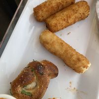 Mozzarella sticks, hearts of palm sticks and garlic knot - also their marinara sauce is delicious!!!  at Pizzanada in Bloomfield