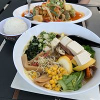 Tofu and tempura veggies in volcano sauce and tofu ramen with veggies. So tasty! at Ichi Ni San in Daytona Beach