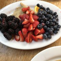 Fruit crepe. Topped with tons of fruit 🍓🫐  at The Crêpe Place in Santa Cruz
