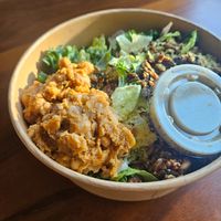 Vegan Ceasar Salad with dressing on the side at Kokomo in North Vancouver