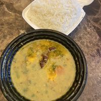 dal and rice. according to the worker this is the only thing without dairy now and none of the naan is vegan either 🫨  at Spice Culture Grocery Store in Winter Garden
