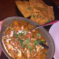 Vegan gluten free pancake and vegan main dish Subzi Mung Bean-coconut and mung curry with vegetables.  at Kaali Gourmet Indian in Noosa Heads