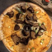 Vegan Buffalo Pizza- just cheeze pizza and the seitan sausage was dry and should have been added after cooking the pizza.  at Trinity Brewing Company in Colorado Springs