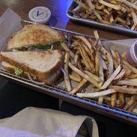 chickpea salad sandwich with onion instead of tomato with a side of fries and vegan ranch  at Trinity Brewing Company in Colorado Springs
