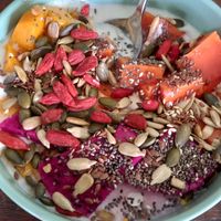 Coconut yogurt with mixed fruit and mixed seeds at Pim's Organic Boutique in Koh Phangan