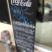 The blackboard in front of their restaurant with their Veggie and Vegan options (Vegan spellt wrong) at küBBan in Biel