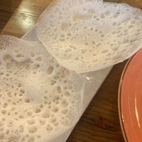 Appam - I’d never had anything like these before but they were great! I love the texture! at Kayal in Nottingham