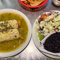 Sweet potato tostada and the salad, beans and rice plate that comes with it. Also free chips and salsa.  at Taco Temple in Morro Bay