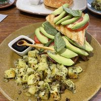 Avocado toast with fried potatoes  at Jack's Café in Cusco