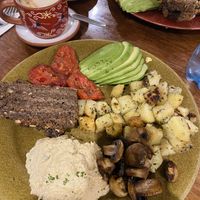 Vegan breakfast with hummus instead of beans.   at Jack's Café in Cusco