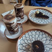 Hit chocolate with soya milk. Just the cake in front is vegan. at Jack's Café in Cusco