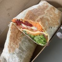 Vegan wrap made fresh on request. Came with salad, roasted pumpkin, chutney and vegan cheese.  at The Baker's Pantry in Noosaville