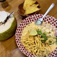 Vegan khao soi with fresh coconut   at Kaek Kao Kua in Bangkok