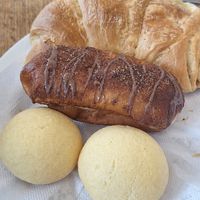 Pan de bono, churro, croissant de bocadillo y queso at The Vegan Bakery (formerly Panadería Rocks) in Bogota