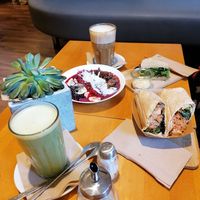 Matcha and mct-coconut latte (both good), "egg" salad sandwich (good), acai bowl (okay) and jackfruit wraps (okay). at Goodies Berlin - Warschauer in Berlin