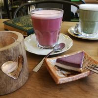 Superfood lattes (beetroot & matcha) and one of their signature raw food mini cakes at Trivitys in Berlin