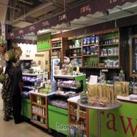 As you enter from Clinton, RAW is to the left and in the rear of the market. at Chicago Raw Food in Chicago