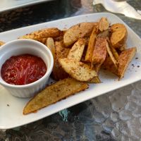 Papitas rústicas  at CactusBerry in Santiago