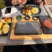 Planted steak on hot stone   at Restaurant Aal Eechternoach in Echternach