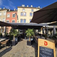 Outdoor seating at Restaurant Aal Eechternoach in Echternach