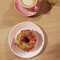 Flat white & matcha strawberry donut at Brammibal's Donuts - Friedrichshain in Berlin