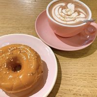 salted caramel hazelnut donut + hot chocolate  at Brammibal's Donuts - Friedrichshain in Berlin