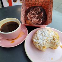 Bienenstich and in box is tiramisu, both yummy crème-filled at Brammibal's Donuts - Friedrichshain in Berlin