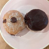 Chocolate bombolini and a Boston cream at Brammibal's Donuts - Friedrichshain in Berlin
