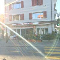 The pizzeria from outside with its terrace at Pizza Huus in Bern