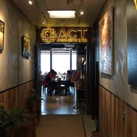 In an office building up to the 15/F and here is the entrance  at Africa Coffee & Tea in Hong Kong Island