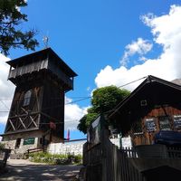 View of the backside of the restaurant with the Franz-Josef-Tower (accesible for free) directly besides the terrace entrance. at Gasthaus Siriuskogl in Bad Ischl