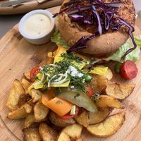 Caesar burger and wedges - AMAZING!  at Kozy Eats  in Riga