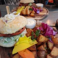Soy burger in front, jackfruit behind at Kozy Eats  in Riga