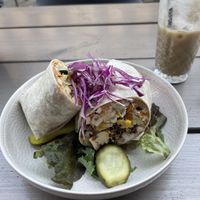 Wrap with Quinoa and Tofu, Iced Coffee with coconut milk  at Kozy Eats  in Riga