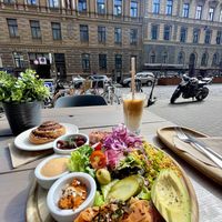 Breakfast plate + Avocado Bread and Cinnamon roll   at Kozy Eats  in Riga