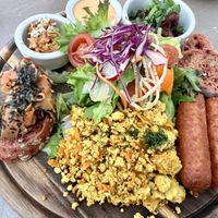 Breakfast plate with added sausage   at Kozy Eats  in Riga